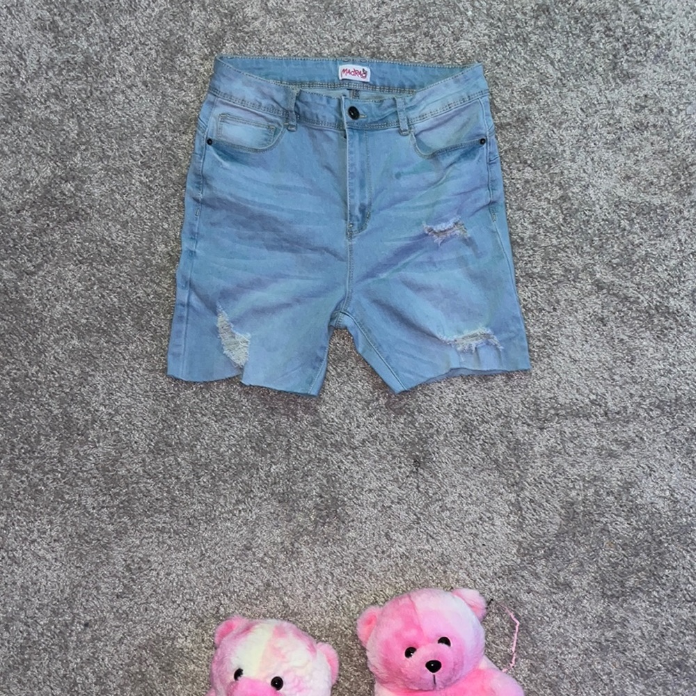 blue ripped shorts